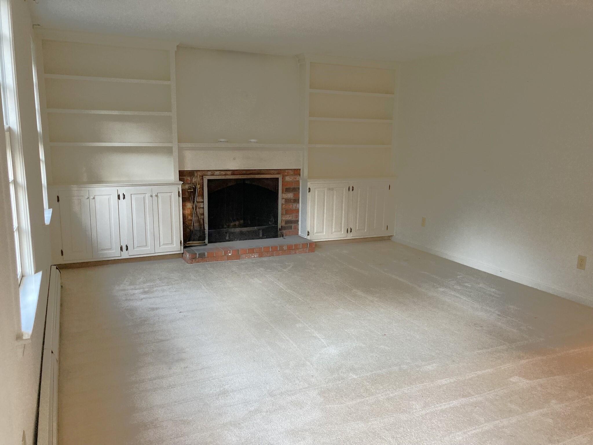 426 Nottingham Drive Centerville, MA 02632 - Photo 5 of 25 a view of empty room with a fireplace