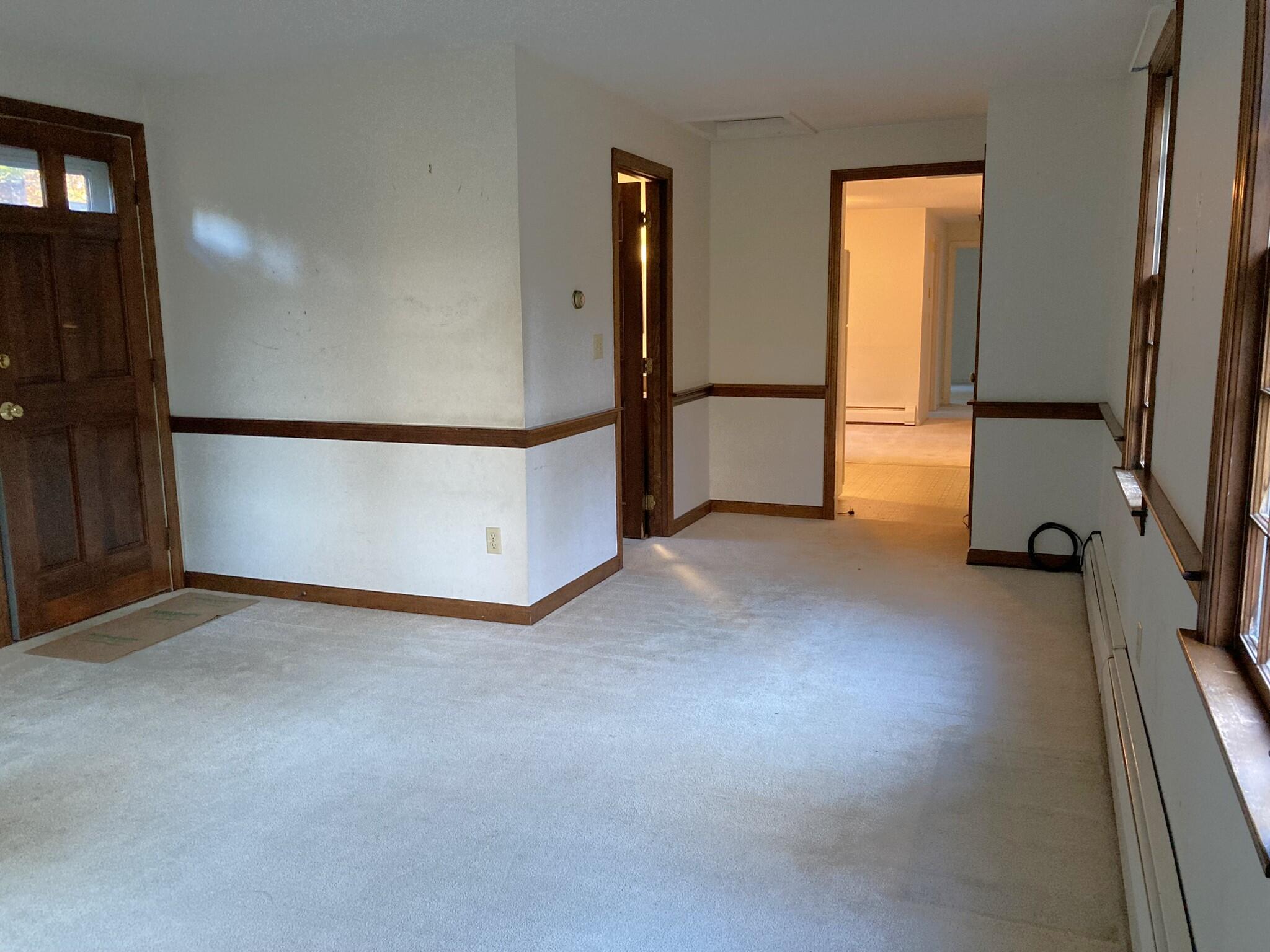 426 Nottingham Drive Centerville, MA 02632 - Photo 8 of 25 a view of an empty room and a window