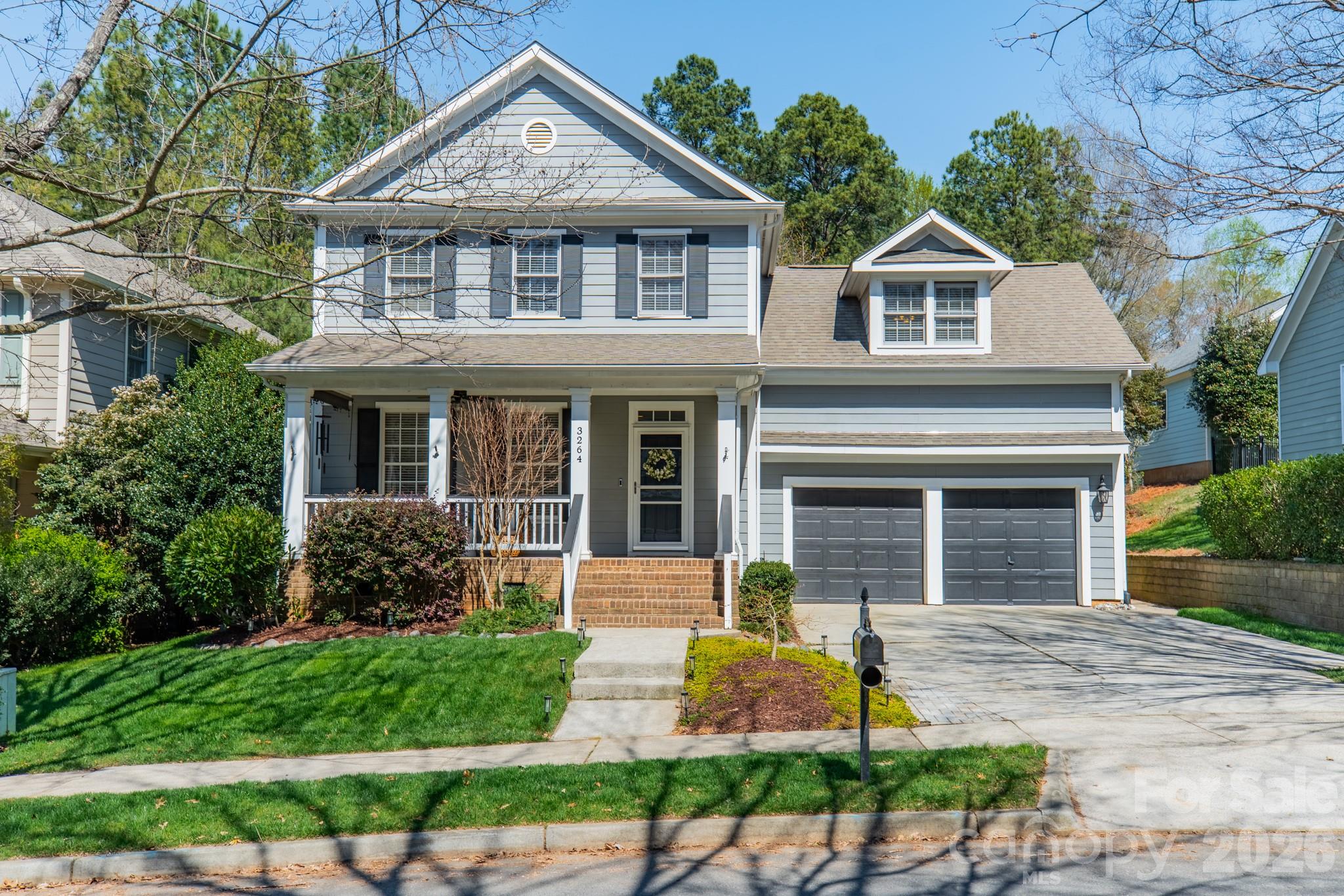 3264 Richard's Crossing Fort Mill, SC 29708 - Photo 1 of 48 front view of a house with a yard