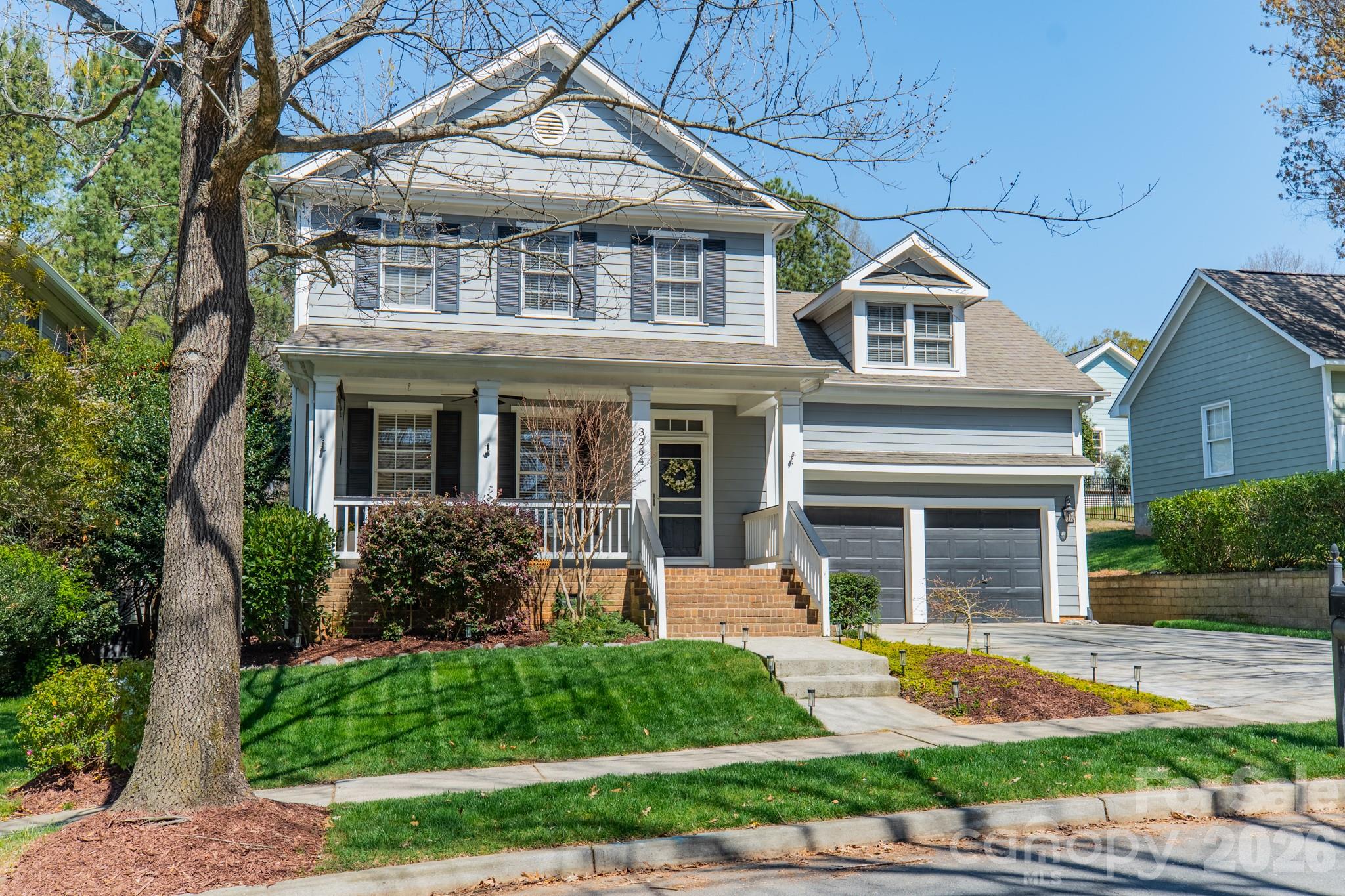 3264 Richard's Crossing Fort Mill, SC 29708 - Photo 2 of 48 front view of a house with a yard