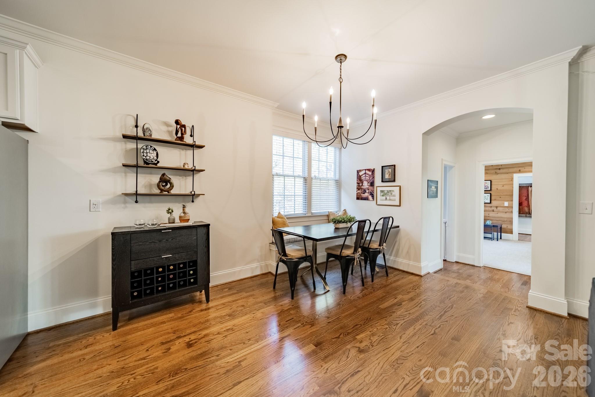 3264 Richard's Crossing Fort Mill, SC 29708 - Photo 21 of 48 a view of a dining room with furniture wooden floor and chandelier