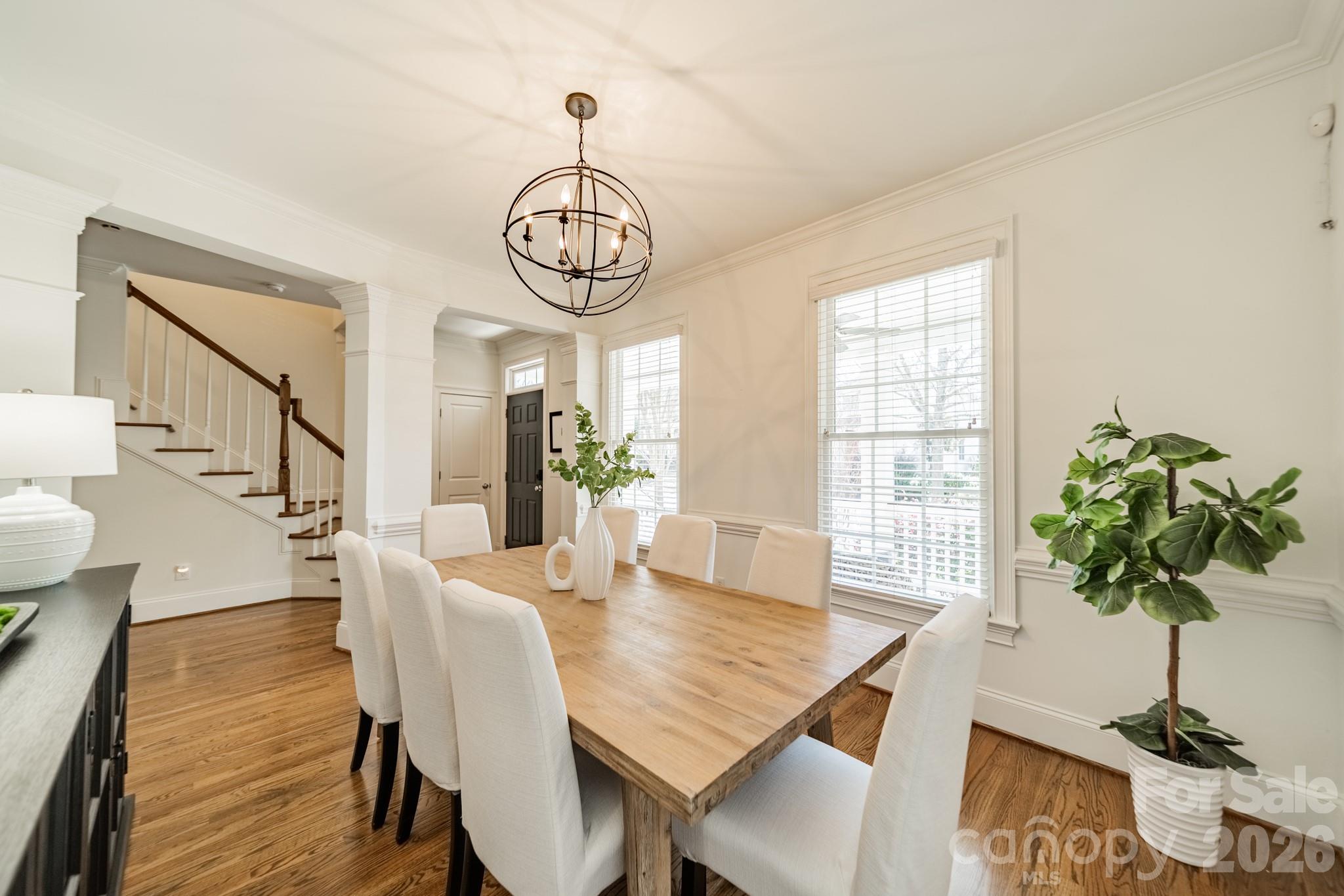 3264 Richard's Crossing Fort Mill, SC 29708 - Photo 7 of 48 a view of a dining room with furniture window and wooden floor