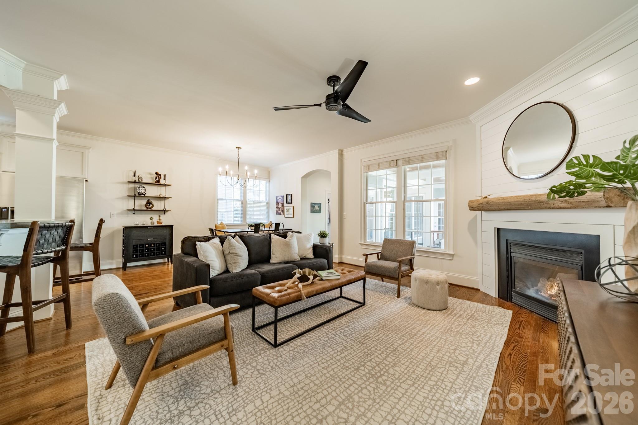 3264 Richard's Crossing Fort Mill, SC 29708 - Photo 9 of 48 a living room with furniture a fireplace and a large window