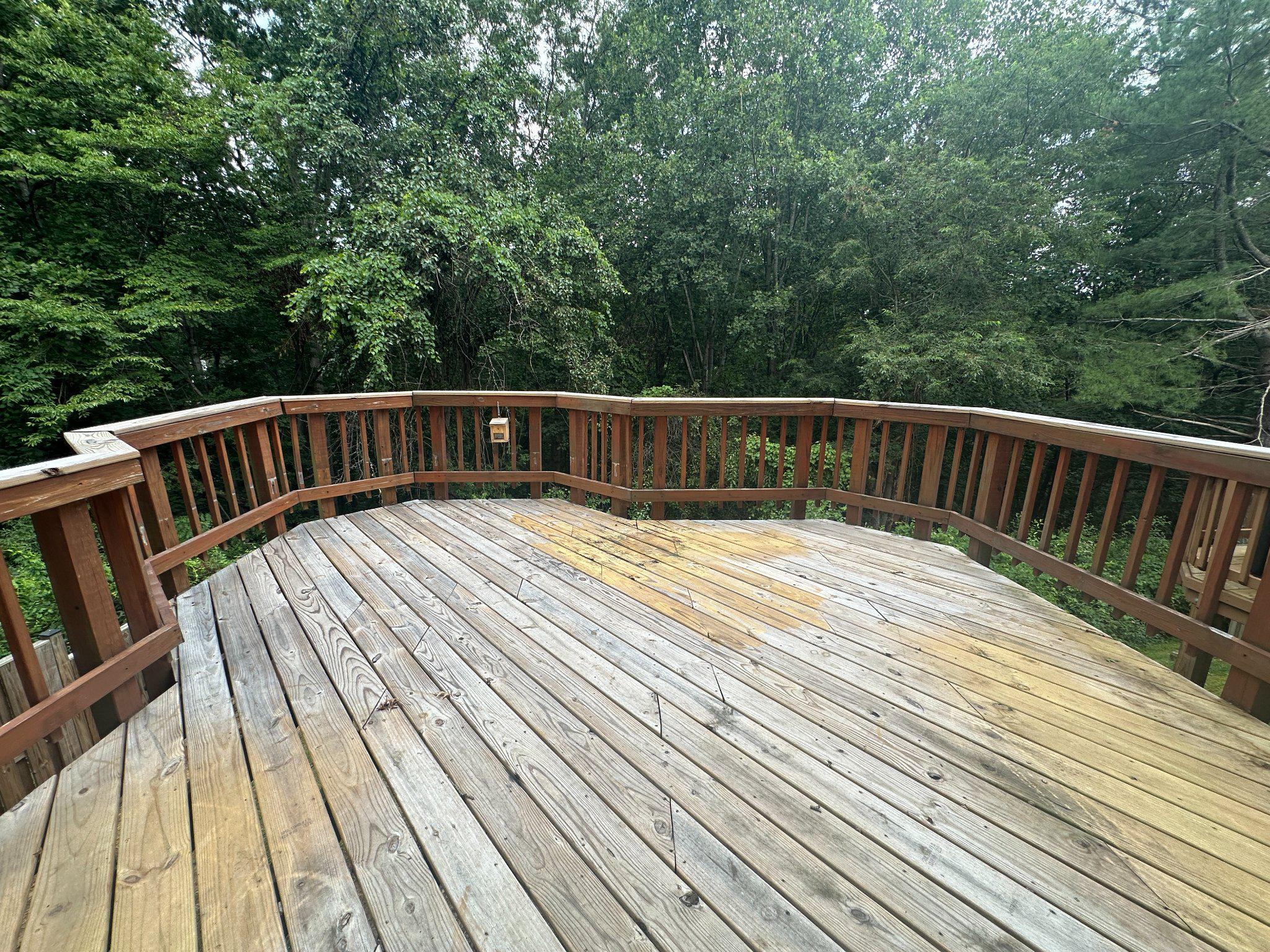 11928 Sentinel Point Court Reston, VA 20191 - Photo 22 of 23 Serene deck overlooking lush greenery.