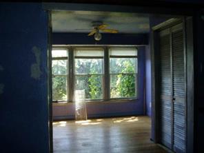 3277 Startown Road Newton, NC 28658 - Photo 5 of 9 a view of empty room with wooden floor and fan