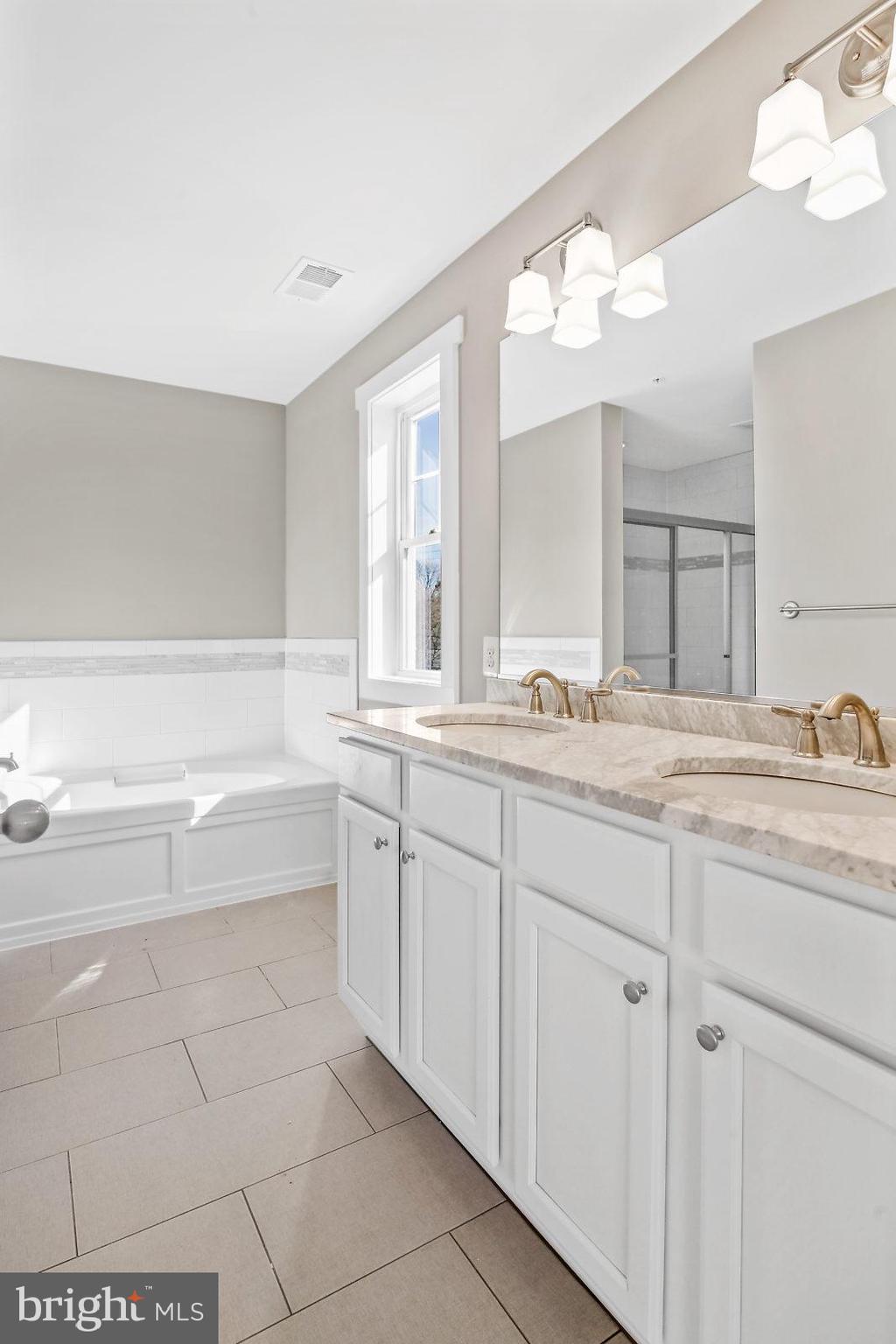 28 Whitney Road Severna Park, MD 21146 - Photo 15 of 30 Master Bath. Dbl. Vanity, Soak Tub, Same Model
