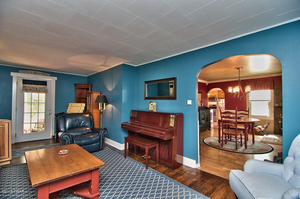 72 Hemlock Road Lake Ariel, PA 18436 - Photo 22 of 48 a living room with furniture and a flat screen tv