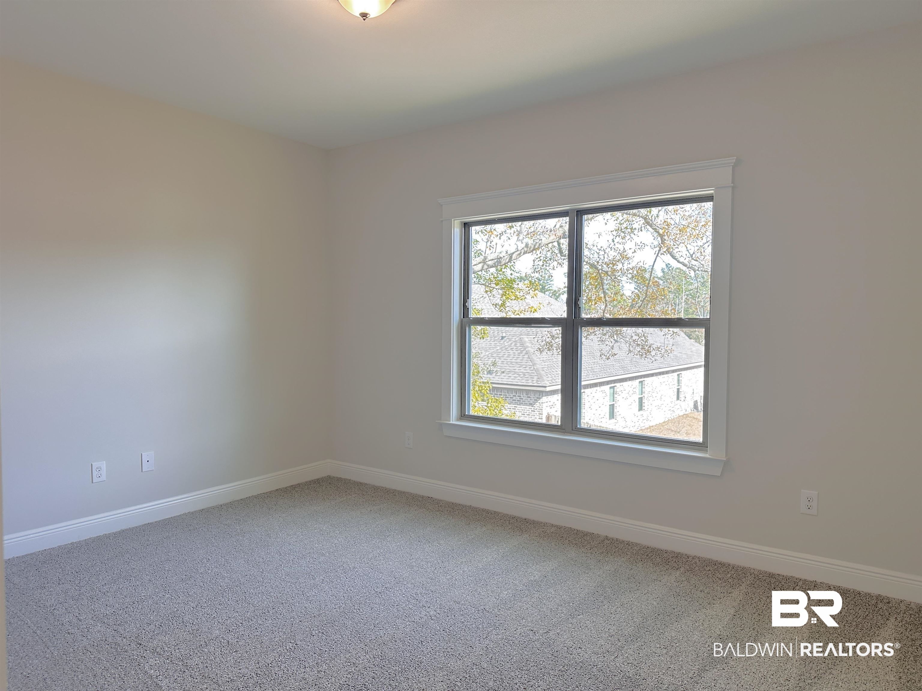 691 Kitfox Avenue Fairhope, AL 36532 - Photo 22 of 42 Unfurnished room featuring carpet flooring