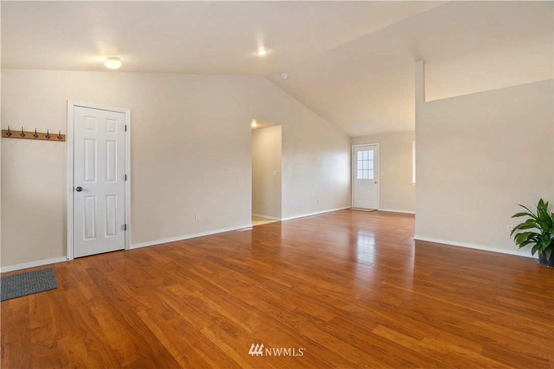 18126 Leitner Road Southwest Rochester, WA 98579 - Photo 14 of 29 a view of empty room with wooden floor