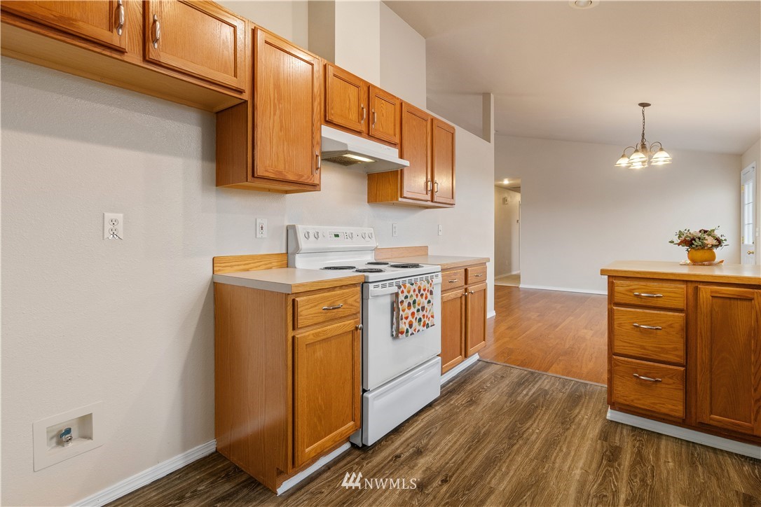 18126 Leitner Road Southwest Rochester, WA 98579 - Photo 17 of 29 a utility room with cabinets washer and dryer