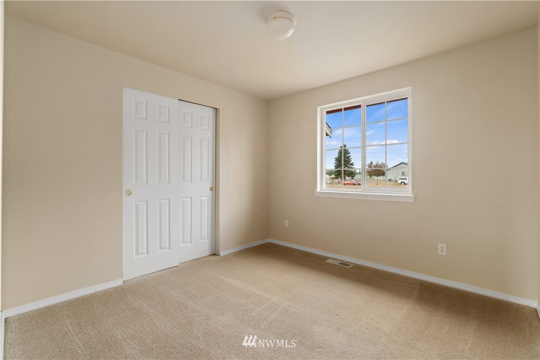 18126 Leitner Road Southwest Rochester, WA 98579 - Photo 18 of 29 an empty room with windows