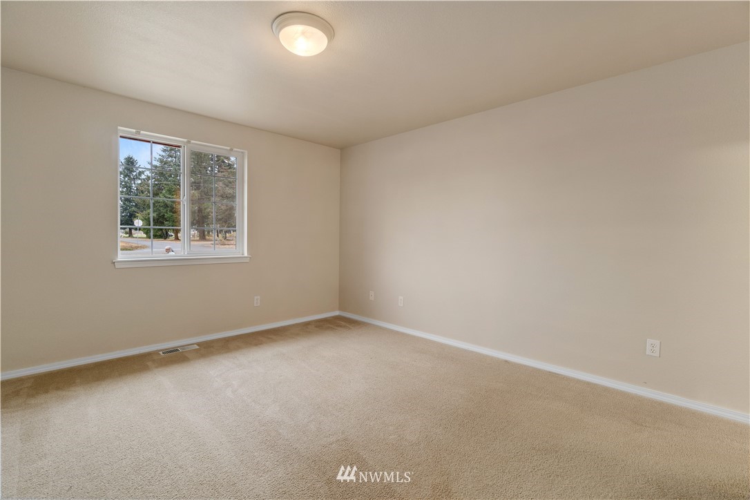 18126 Leitner Road Southwest Rochester, WA 98579 - Photo 19 of 29 an empty room with a window