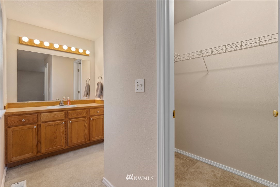 18126 Leitner Road Southwest Rochester, WA 98579 - Photo 20 of 29 a spacious bathroom with a shower and a mirror