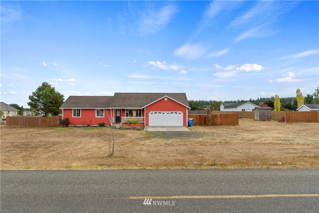 18126 Leitner Road Southwest Rochester, WA 98579 - Photo 29 of 29 a front view of a house with a yard