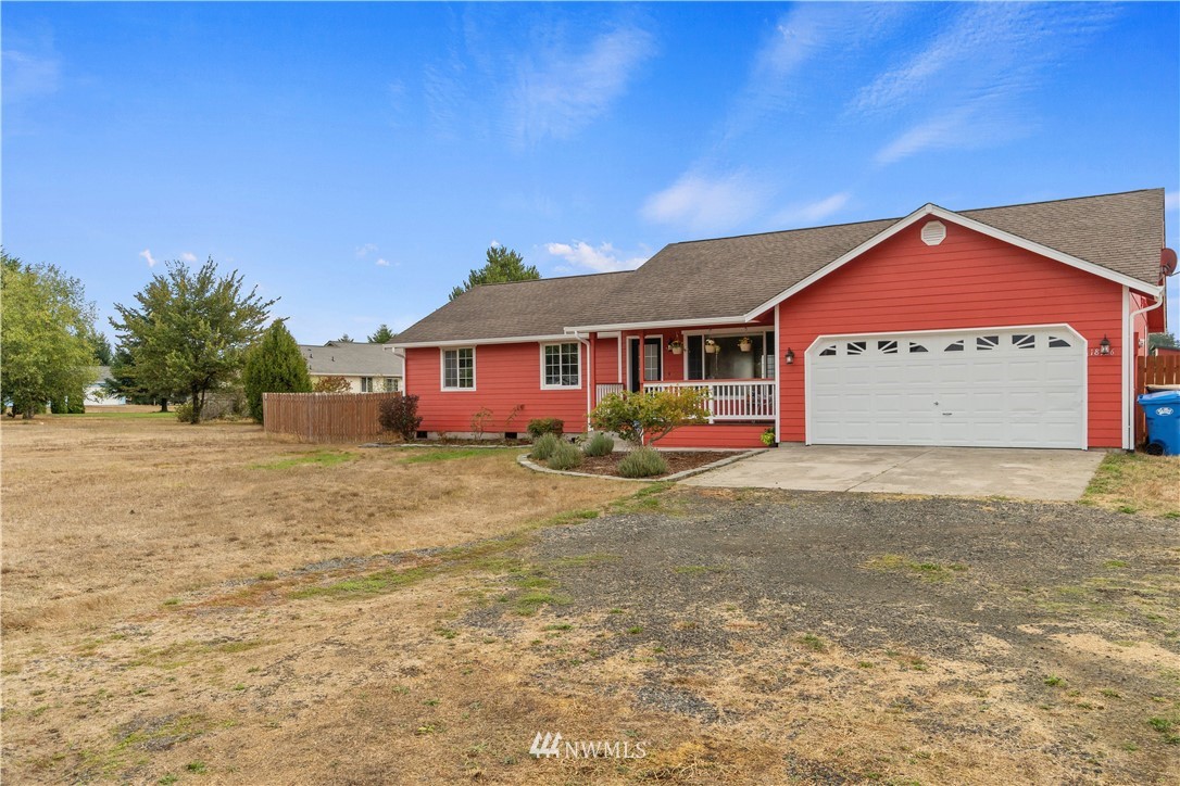 18126 Leitner Road Southwest Rochester, WA 98579 - Photo 4 of 29 a front view of a house with a yard
