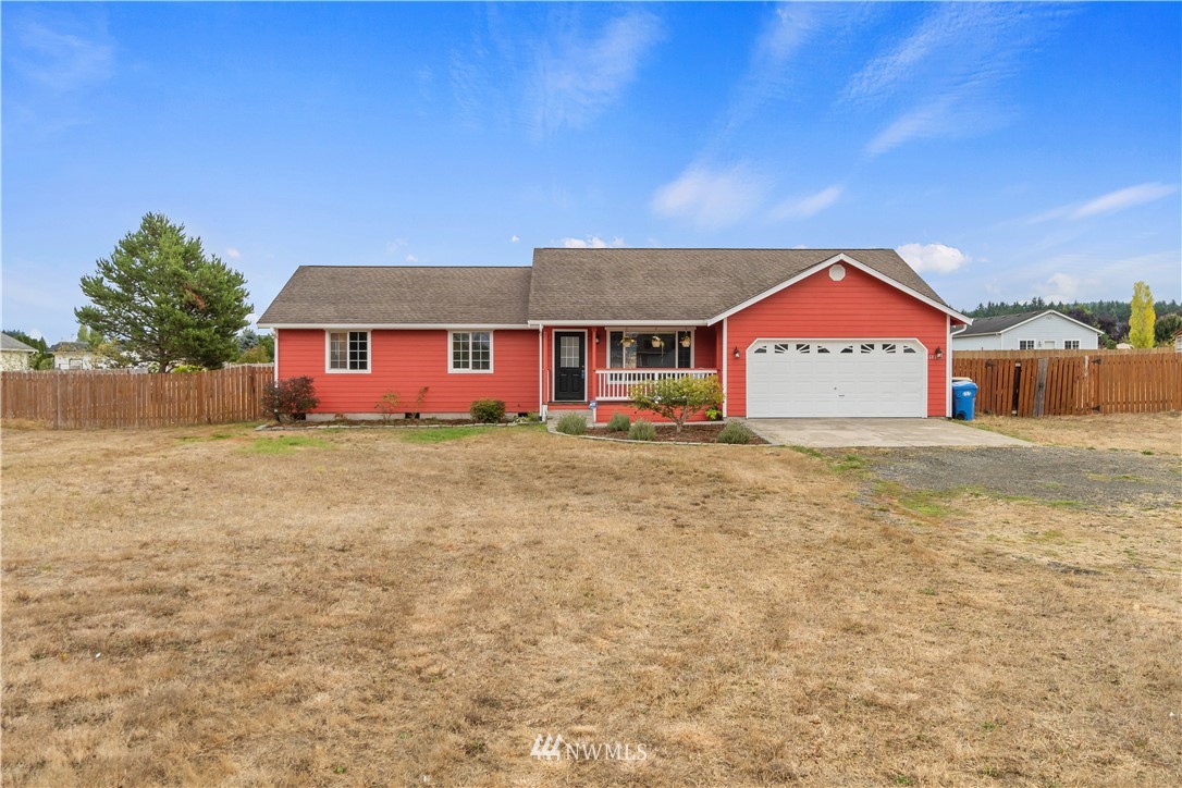 18126 Leitner Road Southwest Rochester, WA 98579 - Photo 5 of 29 a front view of a house with a yard
