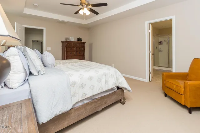 a bedroom with a bed and furniture