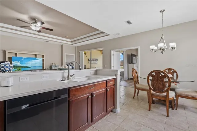a spacious bathroom with a double vanity sink and a mirror