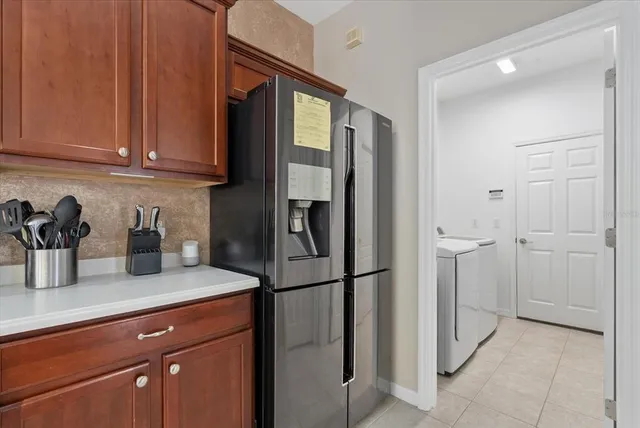 a kitchen with appliances and cabinets