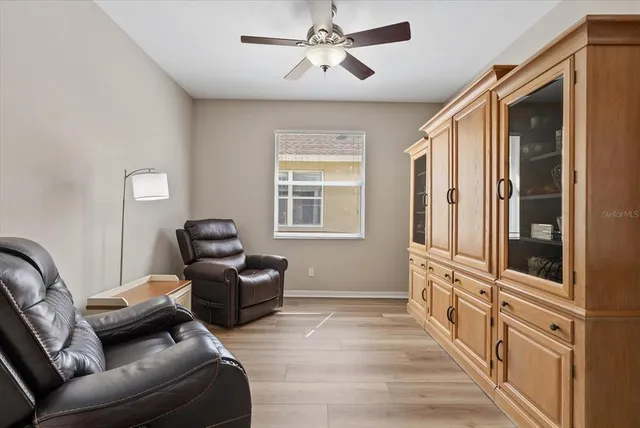 a living room with furniture and a window