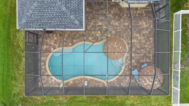 a view of outdoor space swimming pool and furniture