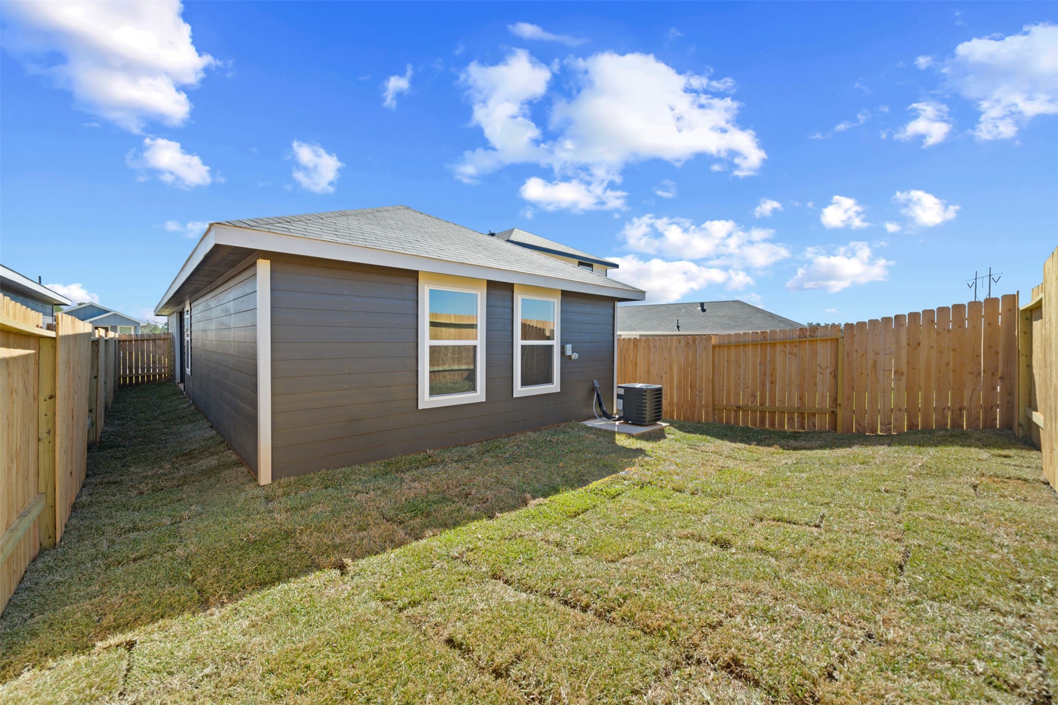 12327 Sword Point Court Willis, TX 77378 - Photo 29 of 30 a view of a backyard