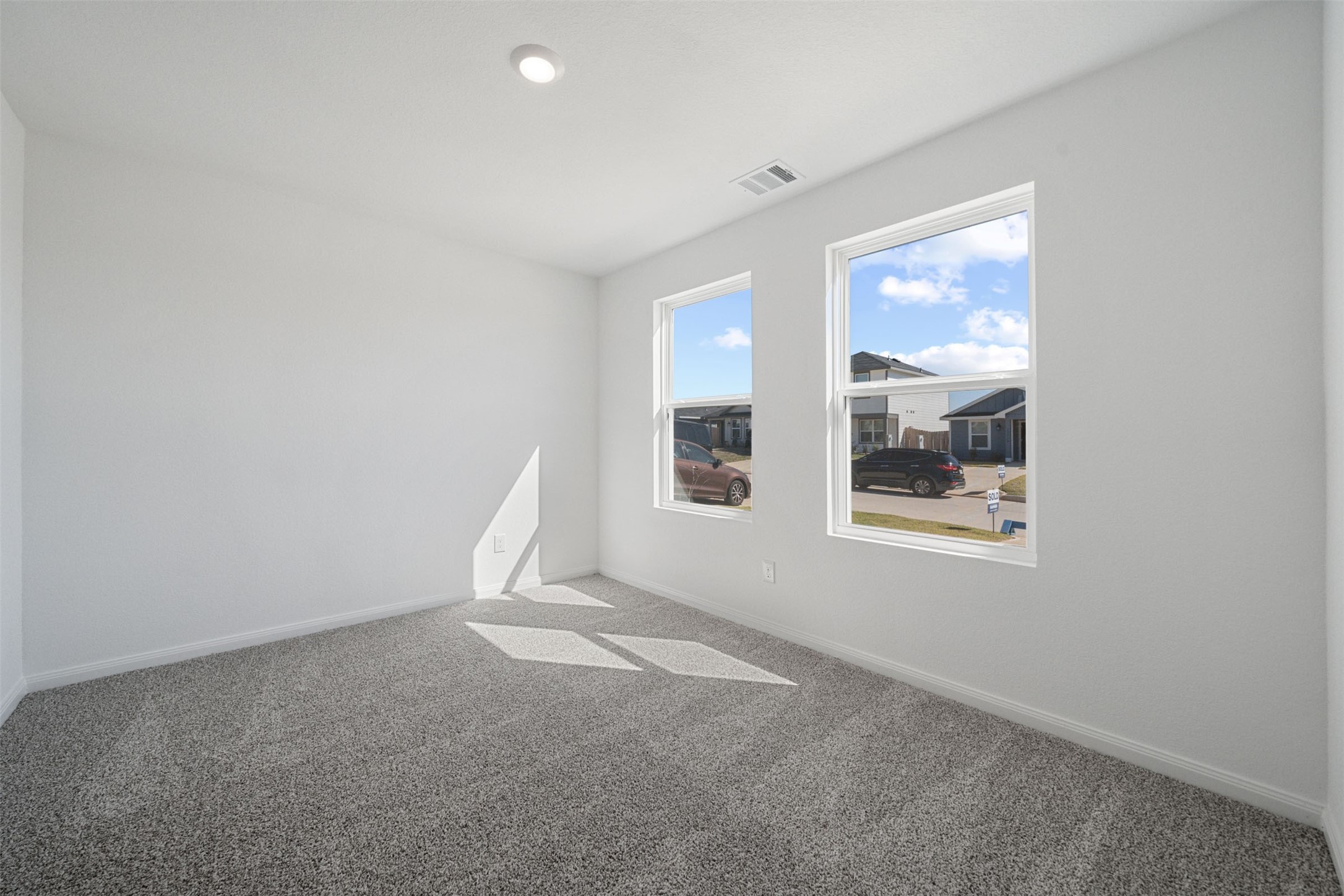 12327 Sword Point Court Willis, TX 77378 - Photo 6 of 30 a view of an empty room with window