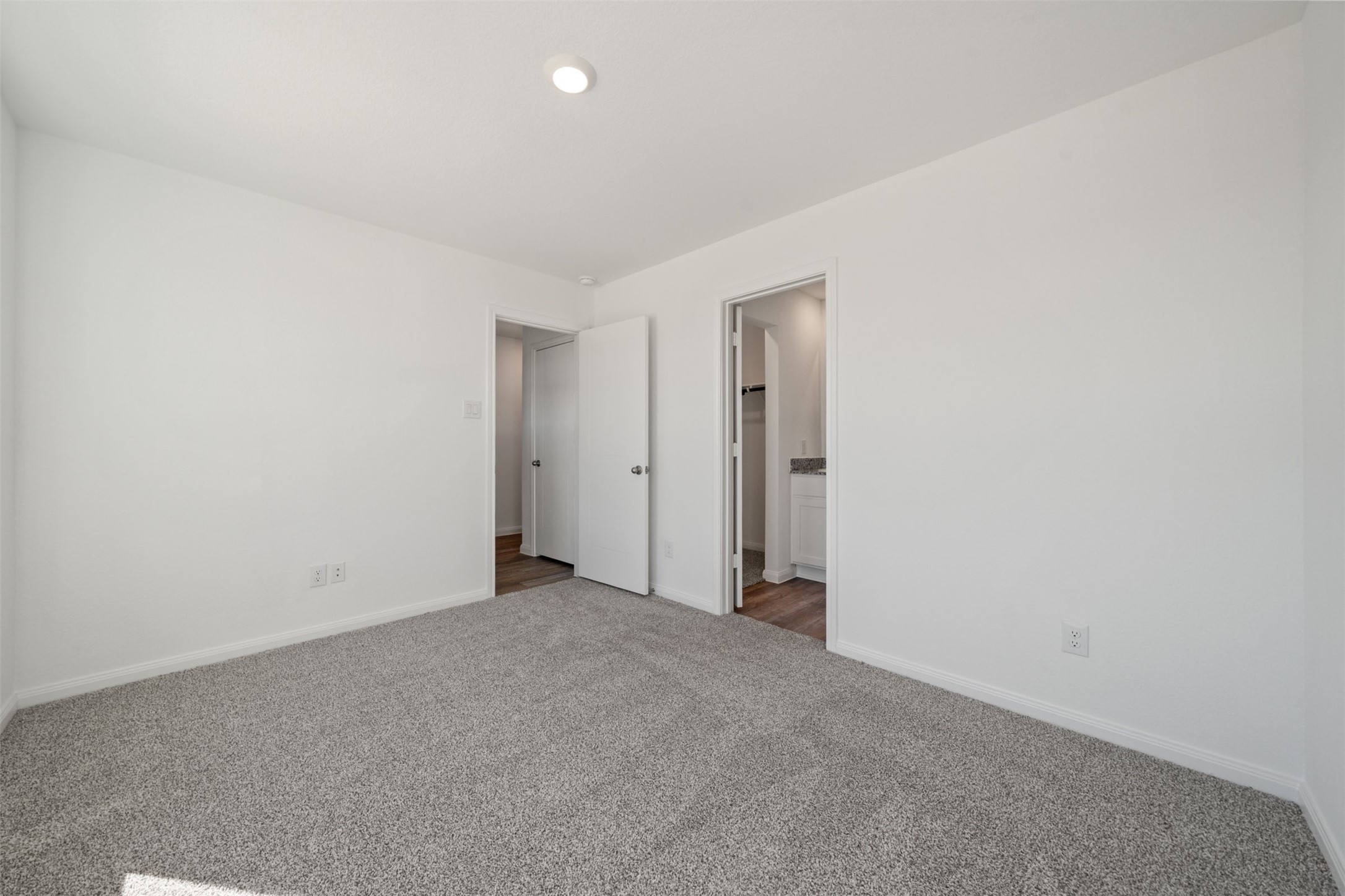 12327 Sword Point Court Willis, TX 77378 - Photo 7 of 30 a view of an empty room