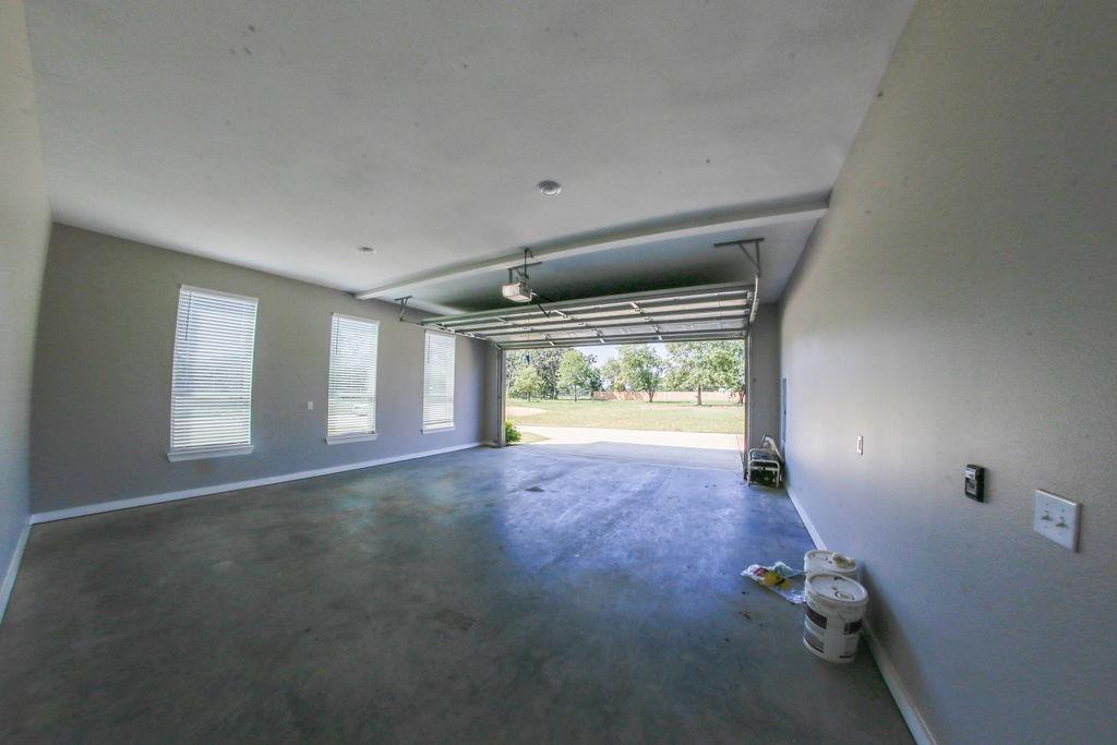 990 Baylor’s Way Reno, TX 75462 - Photo 19 of 22 a view of an empty room with a window