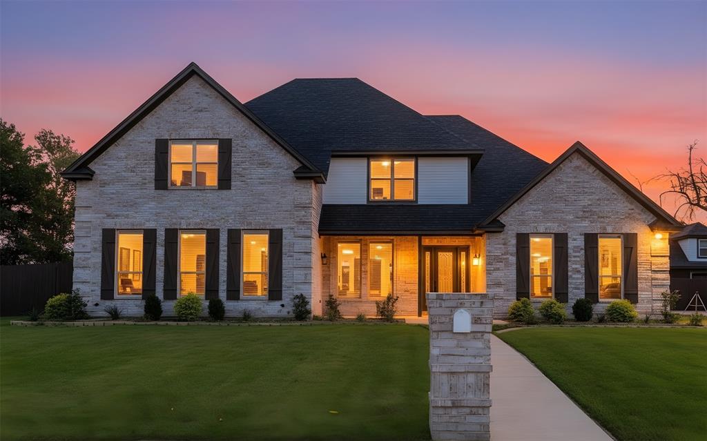 990 Baylor’s Way Reno, TX 75462 - Photo 22 of 22 a front view of a house with a yard
