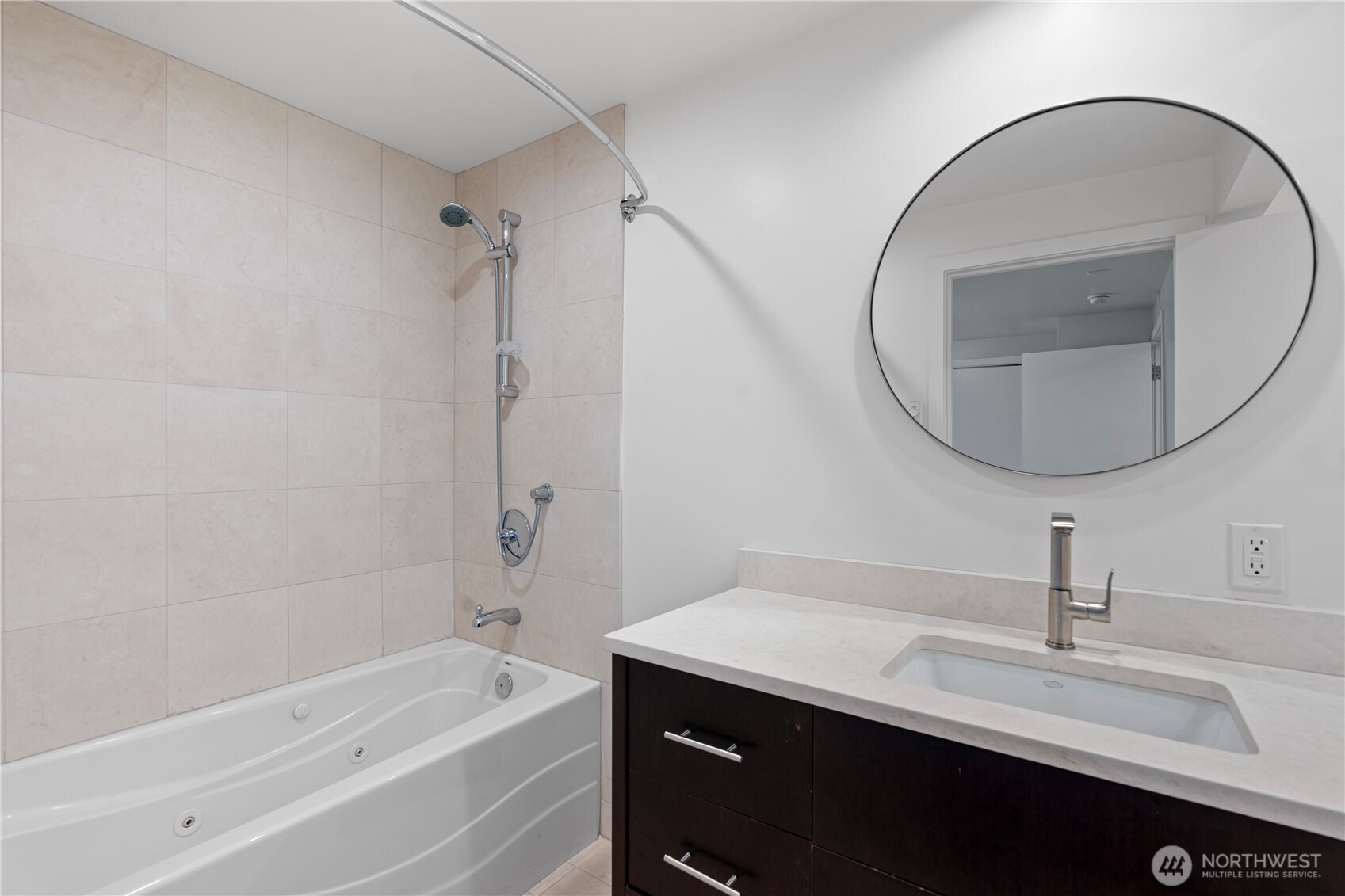 2731 Boylston Avenue East, Unit 300 Seattle, WA 98102 - Photo 9 of 36 a bathroom with a sink and a mirror