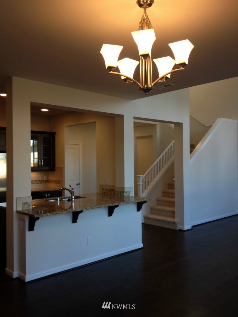 3701 196th Place Southeast, Unit 123 Bothell, WA 98012 - Photo 3 of 12 a view of entryway and kitchen
