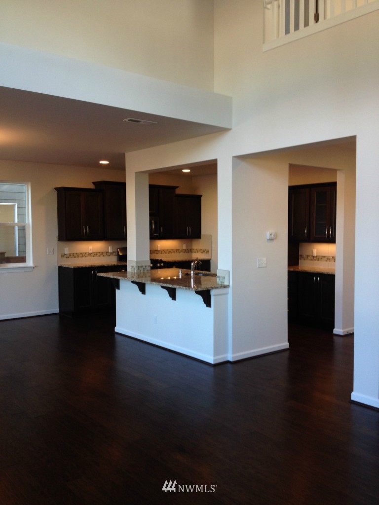 3701 196th Place Southeast, Unit 123 Bothell, WA 98012 - Photo 4 of 12 a view of living room with furniture and flat screen tv