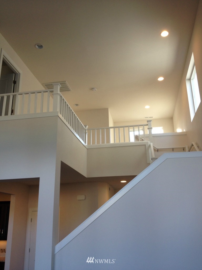 3701 196th Place Southeast, Unit 123 Bothell, WA 98012 - Photo 6 of 12 a view of staircase and kitchen