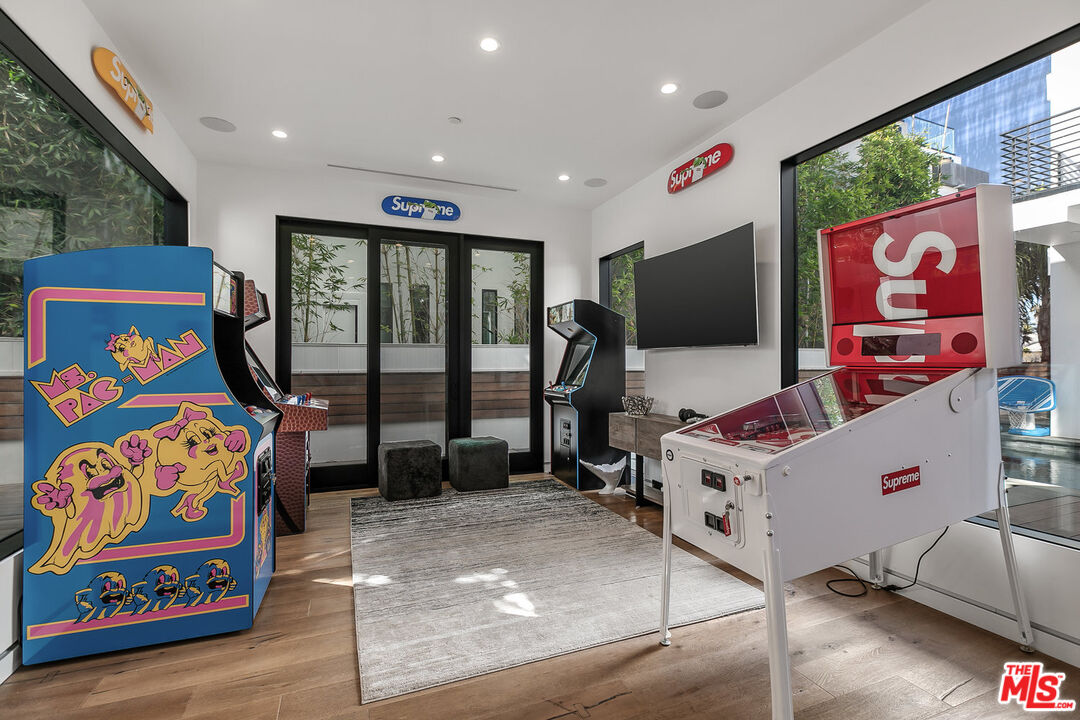 1060 Palms Boulevard Venice, CA 90291 - Photo 12 of 29 a bedroom with furniture and a flat screen tv