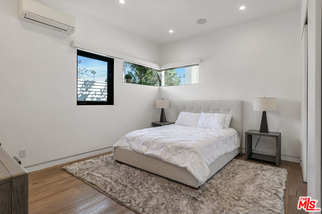 1060 Palms Boulevard Venice, CA 90291 - Photo 13 of 29 a bedroom with a bed and a night stand