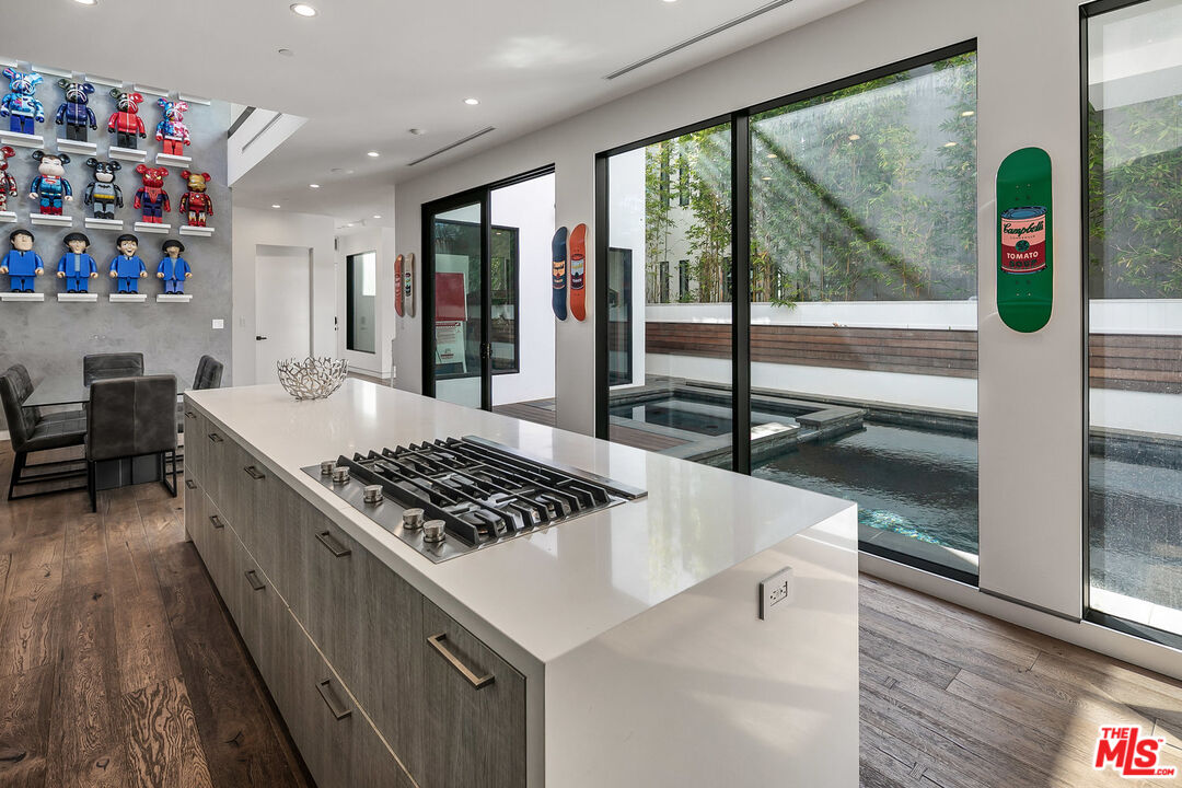 1060 Palms Boulevard Venice, CA 90291 - Photo 10 of 29 a kitchen with stainless steel appliances a stove a sink and a refrigerator
