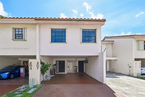 a front view of a house with yard