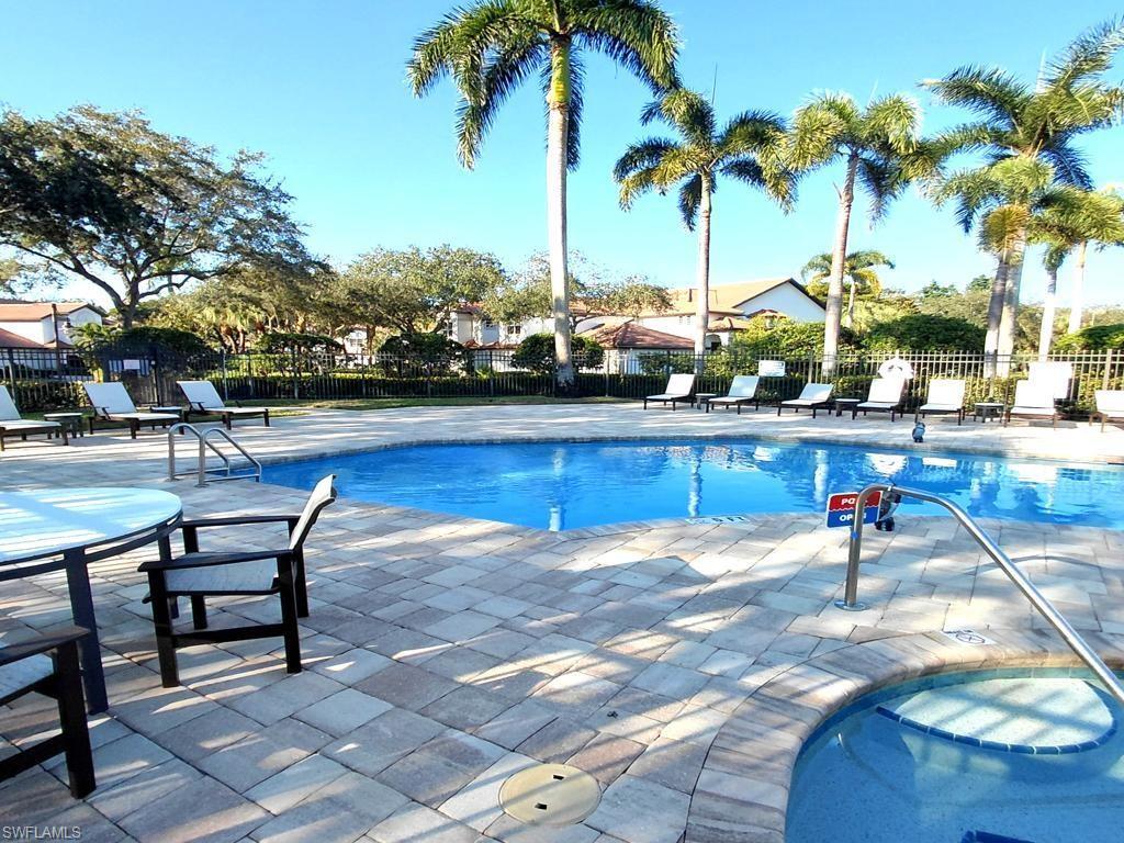 2451 Game Hawk Court, Unit 2502 Naples, FL 34105 - Photo 17 of 30 a park view with palm trees
