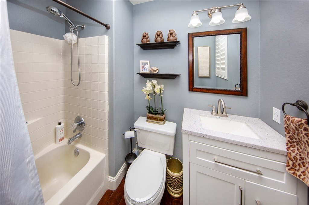 25313 Rolling Greens Way Saugus, CA 91350 - Photo 15 of 28 a bathroom with a sink toilet and shower