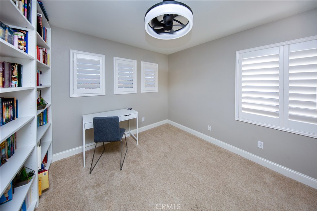 25313 Rolling Greens Way Saugus, CA 91350 - Photo 24 of 28 a view of a workspace with furniture and a window