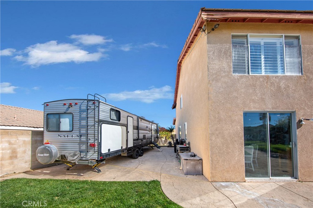 25313 Rolling Greens Way Saugus, CA 91350 - Photo 27 of 28 a view of a house with a yard