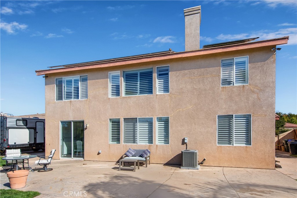 25313 Rolling Greens Way Saugus, CA 91350 - Photo 28 of 28 a front view of a house with outdoor seating