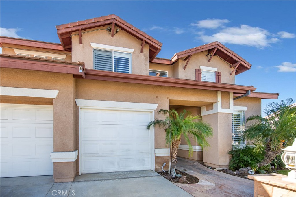 25313 Rolling Greens Way Saugus, CA 91350 - Photo 3 of 28 a view of a house with a small yard