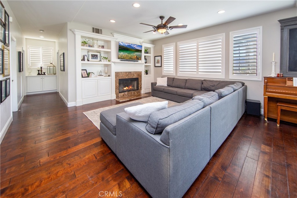 25313 Rolling Greens Way Saugus, CA 91350 - Photo 9 of 28 a living room with furniture and a fireplace