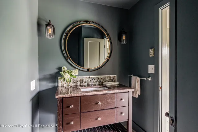 a view of staircase with a rug