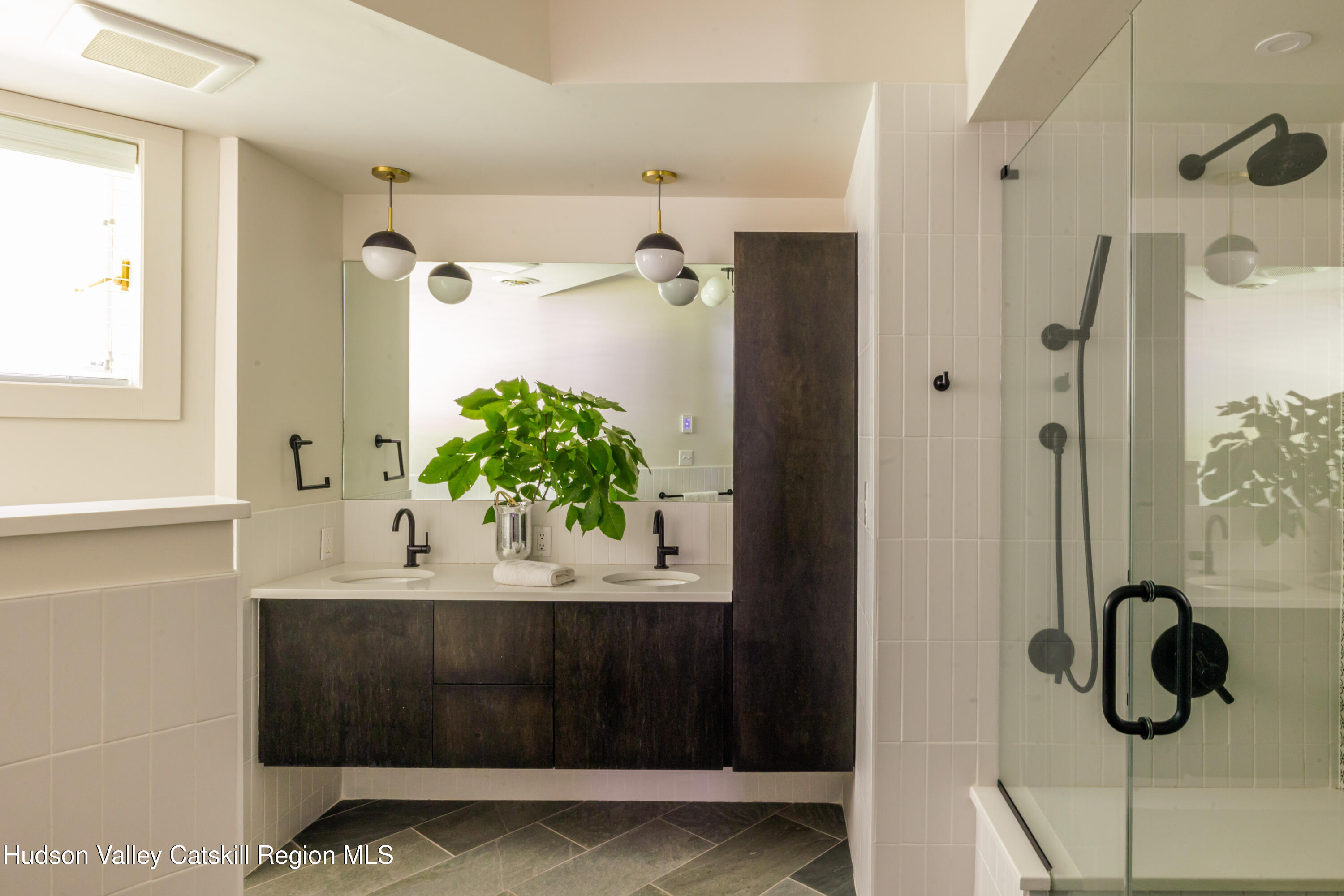 407 Mill Street Windham, NY 12496 - Photo 27 of 39 a bathroom with a shower and a mirror