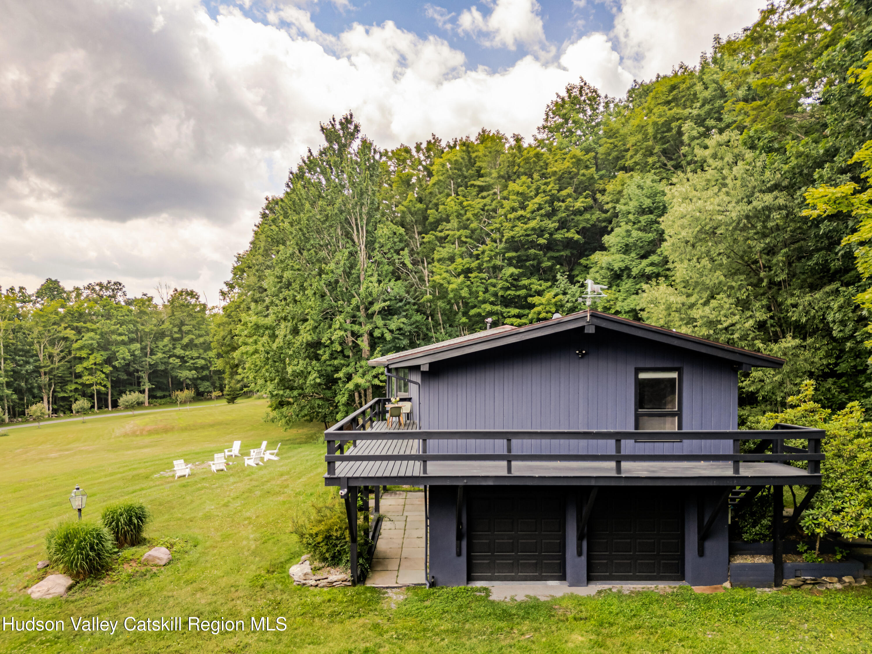 407 Mill Street Windham, NY 12496 - Photo 3 of 39 a view of a house with pool
