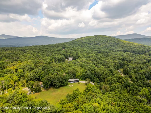 a picture of a door with a white house