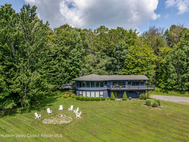 a view of a house with a swimming pool